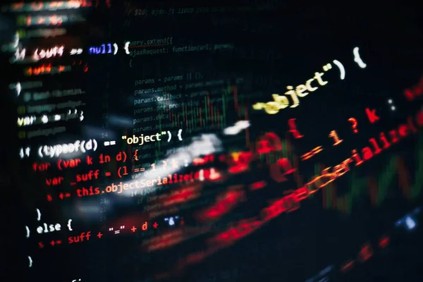 Uso de CSS, JavaScript y HTML. Supervisar el primer plano del código fuente de la función. Antecedentes de tecnología informática abstracta. Código fuente del software. — Foto de Stock