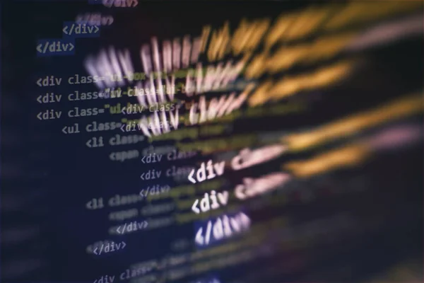 Utilizzo di CSS, JavaScript e HTML. Monitorare da vicino il codice sorgente della funzione. Antecedenti IT astratti. Codice sorgente del software. — Foto Stock