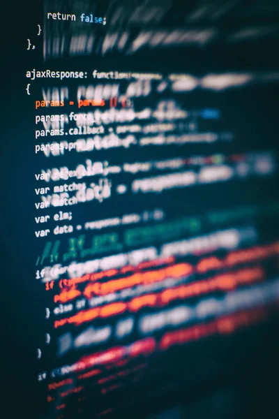 CSS, JavaScript en HTML gebruik. Monitor close-up van functie broncode. Abstract IT technologie achtergrond. Software broncode. — Stockfoto