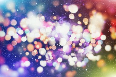 Noel ışığı arka planı. Parlak tatil arkaplanı. Yanıp sönen Yıldızlarla Odaklanmış Arkaplan. Bulanık Bokeh.