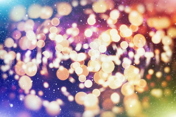 Vánoční světlo pozadí. Dovolená zářící pozadí. Rozostřené pozadí s blikajícími hvězdami. Rozmazaný Bokeh. — Stock fotografie