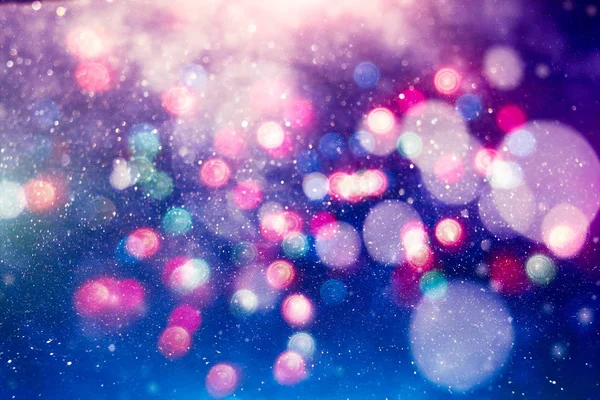 Fondo de luz de Navidad. Fondo brillante de vacaciones. Fondo desenfocado con estrellas parpadeantes. Bokeh borrosa. —  Fotos de Stock