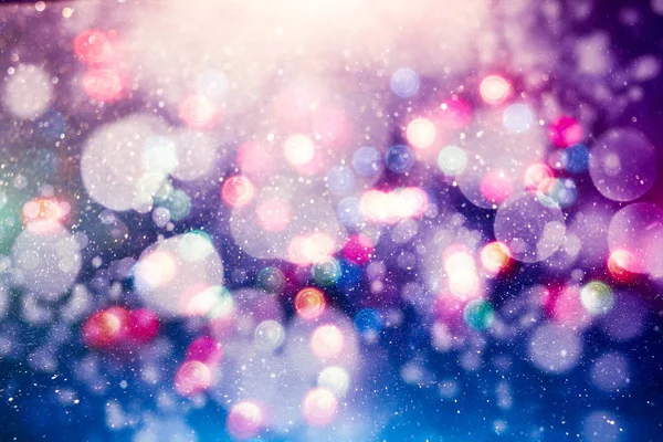 Sfondo luce di Natale. Vacanza sfondo incandescente. Sfondo sfocato con stelle lampeggianti. Bokeh offuscata. — Foto Stock