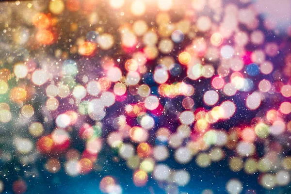 Sfondo luce di Natale. Vacanza sfondo incandescente. Sfondo sfocato con stelle lampeggianti. Bokeh offuscata. — Foto Stock