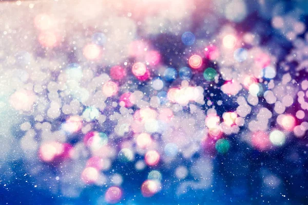 Fundo de luz de Natal. Fundo brilhante de férias. Contexto desfocado com estrelas cintilantes. Bokeh desfocado. — Fotografia de Stock