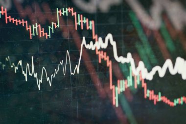 İş grafik arka planı: analiz iş muhasebe bilgi levhalar üzerinde. İşadamı el altın piyasa, Forex piyasası ve ticaret pazarı için yatırım grafikleri analiz üzerinde çalışma.