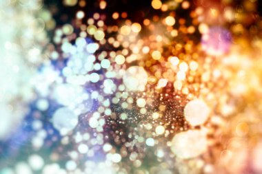 Noel ışığı arka planı. Parlak tatil arkaplanı. Yanıp sönen Yıldızlarla Odaklanmış Arkaplan. Bulanık Bokeh.