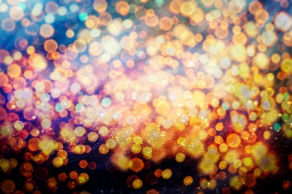 Abstraktes Licht Feier Hintergrund mit defokussierten goldenen Lichtern für Weihnachten, Neujahr, Urlaub, Party — Stockfoto