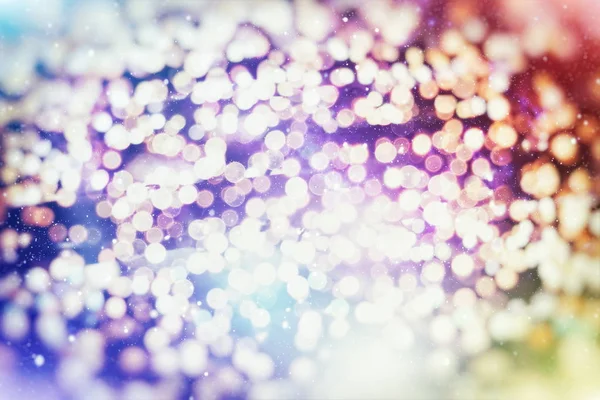 Fondo de luz de Navidad. Fondo brillante de vacaciones. Fondo desenfocado con estrellas parpadeantes. Bokeh borrosa. —  Fotos de Stock