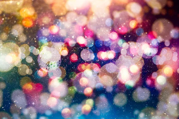 Fundo de luz de Natal. Fundo brilhante de férias. Contexto desfocado com estrelas cintilantes. Bokeh desfocado. — Fotografia de Stock