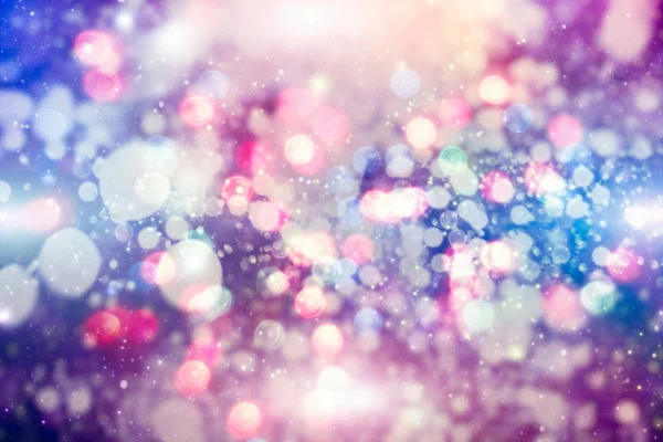 Fundo de luz de Natal. Fundo brilhante de férias. Contexto desfocado com estrelas cintilantes. Bokeh desfocado. — Fotografia de Stock