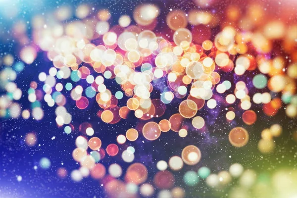 Fundo de luz de Natal. Fundo brilhante de férias. Contexto desfocado com estrelas cintilantes. Bokeh desfocado. — Fotografia de Stock