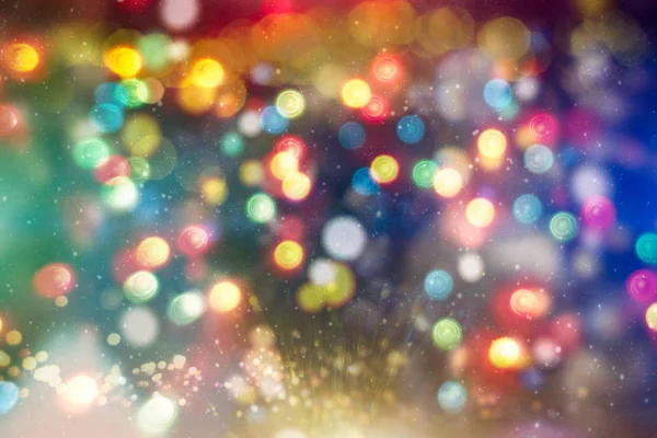 Fondo de luz de Navidad. Fondo brillante de vacaciones. Fondo desenfocado con estrellas parpadeantes. Bokeh borrosa. — Foto de Stock