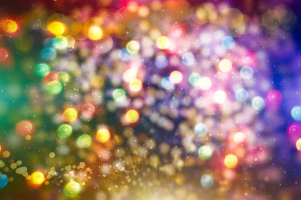 Fundo de luz de Natal. Fundo brilhante de férias. Contexto desfocado com estrelas cintilantes. Bokeh desfocado. — Fotografia de Stock