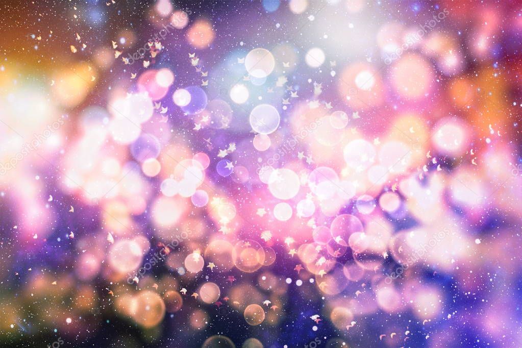 Christmas light background. Holiday glowing backdrop. Defocused Background With Blinking Stars. Blurred Bokeh.