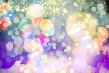 Mor ve sarı soyut arka plan .bokeh bulanık güzel parlak ışıklar Noel