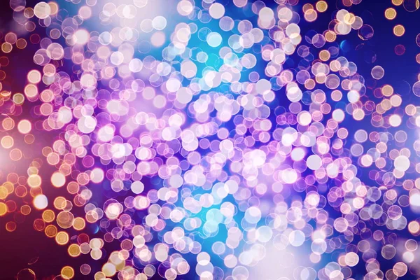 Paarse en gele abstracte achtergrond. bokeh wazig mooie glanzende lichten kerst — Stockfoto