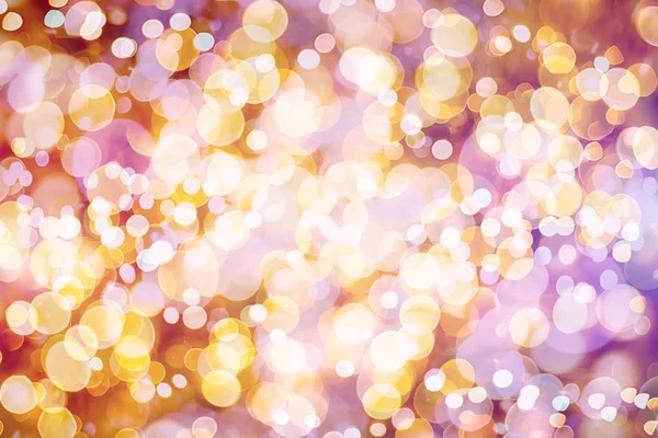 Lila und gelb abstrakten Hintergrund .bokeh verschwommen schöne glänzende Lichter Weihnachten — Stockfoto