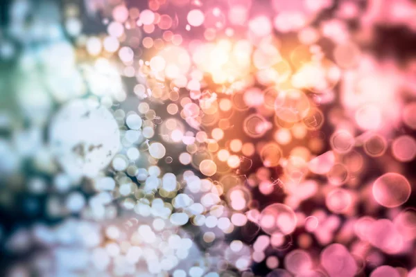 renk ve parlak güneş ışığı ile doğa zemin. Bokeh arka plan veya Noel yaz tatilleri ve kavramı.