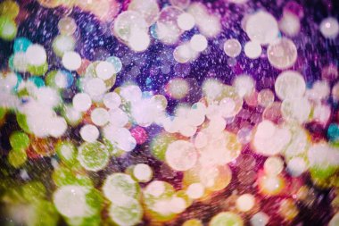 Noel bokeh parlayan Arka Plan. Parlayan Tatil Soyut Defocused renkli Backdrop. Parlak canlı Bulanık renkli Yeni Yıl tatili Bokeh