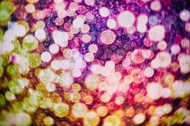 Noel bokeh parlayan Arka Plan. Parlayan Tatil Soyut Defocused renkli Backdrop. Parlak canlı Bulanık renkli Yeni Yıl tatili Bokeh