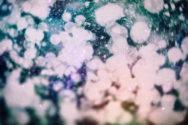 Noel bokeh parlayan Arka Plan. Parlayan Tatil Soyut Defocused renkli Backdrop. Parlak canlı Bulanık renkli Yeni Yıl tatili Bokeh