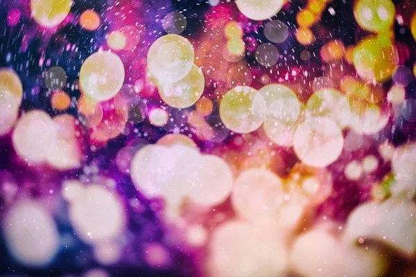 Christmas bokeh glowing Background. Glowing Holiday Abstract Defocused colorful Backdrop. Bright vivid Blurred colourful New Year holiday Bokeh — Stock Photo, Image
