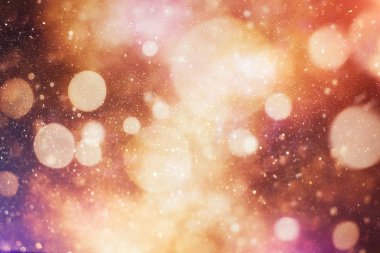 doğal bokeh ve parlak altın ışık şenlikli arka plan. Vintage sihirli arka plan ile renkli bokeh.