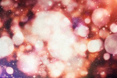 doğal bokeh ve parlak altın ışık şenlikli arka plan. Vintage sihirli arka plan ile renkli bokeh.