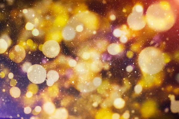 doğal bokeh ve parlak altın ışık şenlikli arka plan. Vintage sihirli arka plan ile renkli bokeh.
