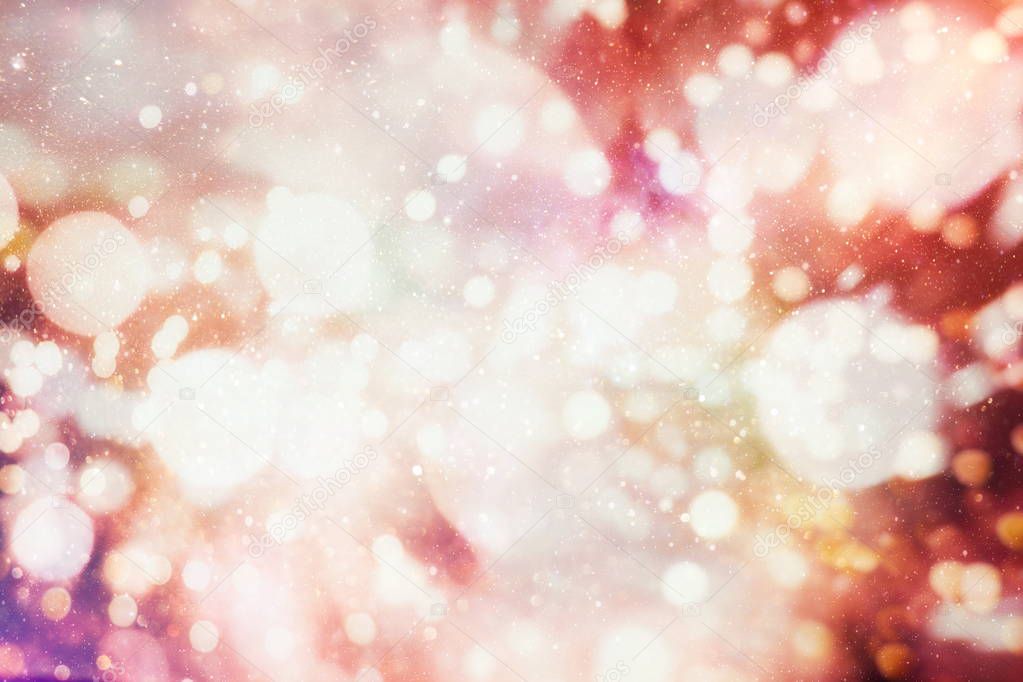Festive background with natural bokeh and bright golden lights. Vintage Magic background with colorful bokeh.