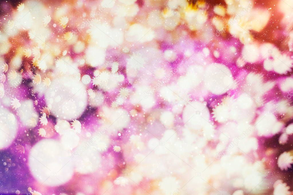 Festive background with natural bokeh and bright golden lights. Vintage Magic background with colorful bokeh.