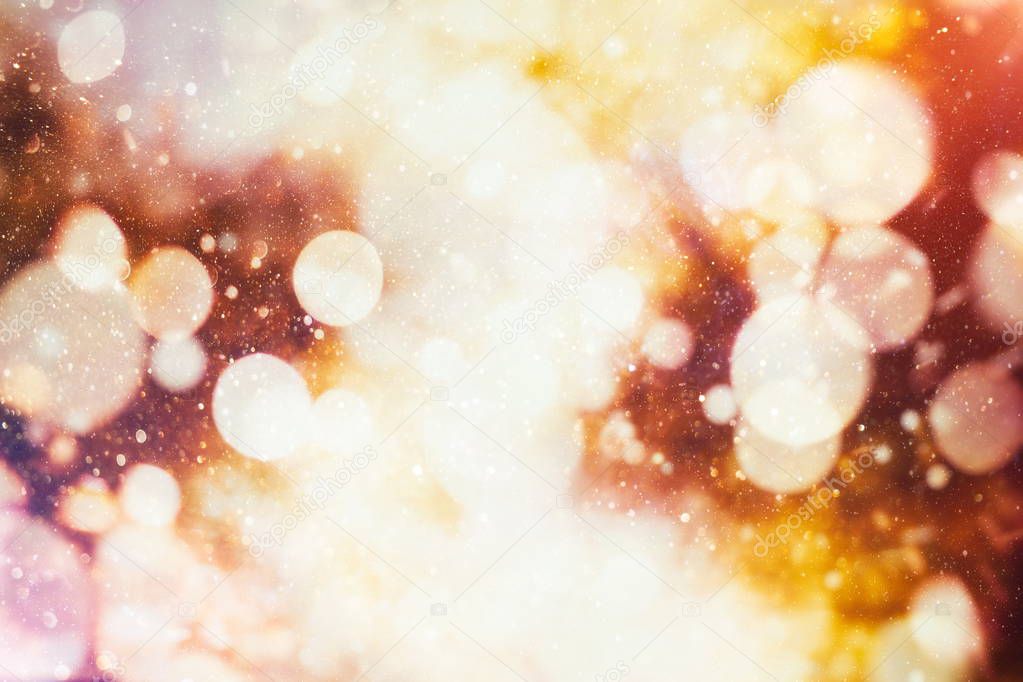 Festive background with natural bokeh and bright golden lights. Vintage Magic background with colorful bokeh.