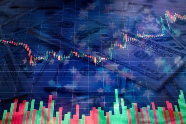 Borsa grafiği öndeki ekranda. Finans ve yatırım konsepti. Seçici odak.