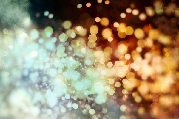 Fondo abstracto de luces amarillas borrosas con efecto bokeh, año nuevo 2020 —  Fotos de Stock