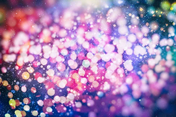 Abstract glitterlichten en sterren. Feestelijke blauwe en witte kleur sprankelende vintage achtergrond. wazig bokeh kerst achtergrond met sneeuwvlokken — Stockfoto