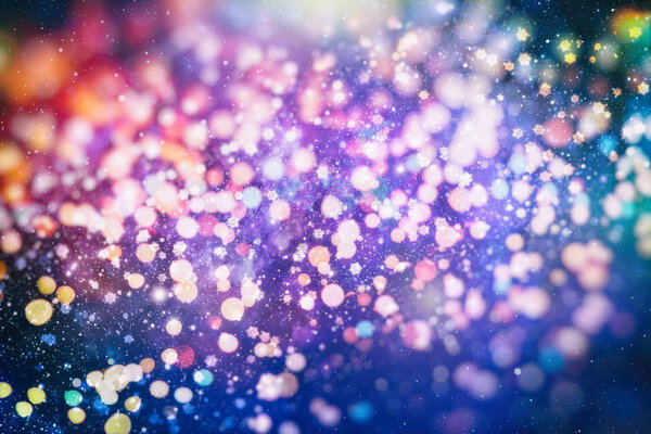 Abstract glitter lights and stars. Festive blue and white color sparkling vintage background . Blurred bokeh christmas background with snowflakes