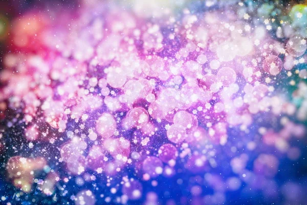 Abstract glitter lights and stars. Festive blue and white color sparkling vintage background . Blurred bokeh christmas background with snowflakes — Stock Photo, Image