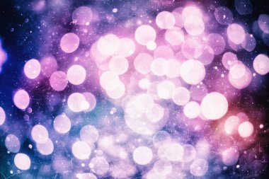 Bokeh efektli bulanık sarı ışıkların soyut arkaplanı, yeni yıl