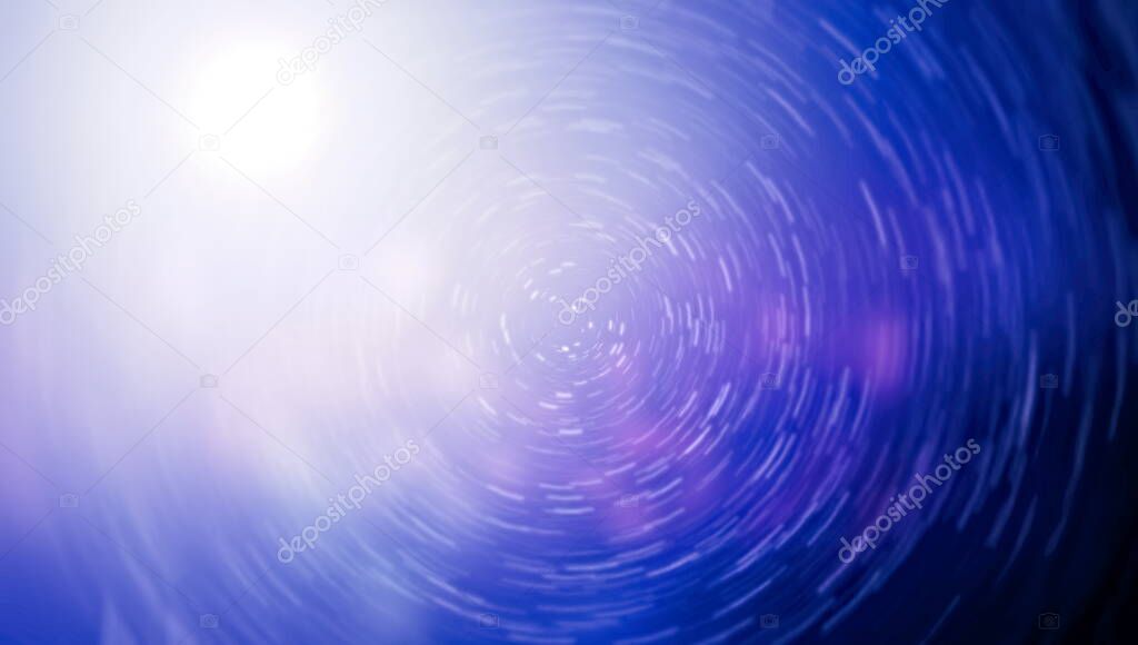 Space Travelling in the Speed of Light. Abstract of warp or hyperspace motion in blue star trail.