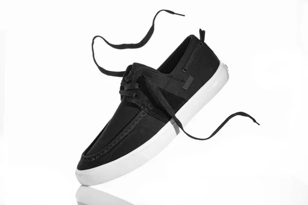 Black men's sneakers on a white background. — Stock Photo, Image