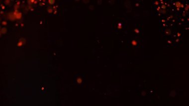 Suda parıldıyor. Su, soyut bulut formasyonları siyah zemin üzerine kırmızı glitter boya. Parlak geçişler, sanat modern projeler için eklendi olarak kullanılabilir. Ağır çekim