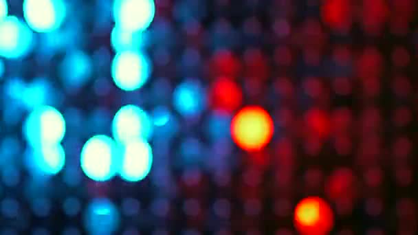 Paillettes rouges et bleues fond réfléchissant étincelant. Mur pailleté cinétique abstrait en mouvement. Décoration de boîte de nuit. Peut être utilisé comme transitions, ajouté à des projets modernes, milieux artistiques .