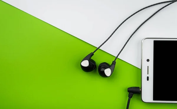 Auriculares Teléfono Inteligente Dispositivo Móvil Fondo Color —  Fotos de Stock