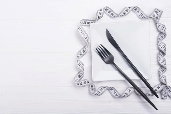 Gabel Und Messer Mit Weißem Maßband Ernährung Lebensmittel Hintergrund — Stockfoto