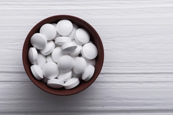 Gros Plan Des Pilules Médicales Sur Table Blanche Vue Dessus — Photo