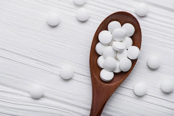 White Medical Pills Wooden Spoon Medicine Background — Stock Photo, Image