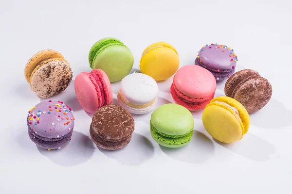 Many colored sweet macaroons cookie isolated on a white background