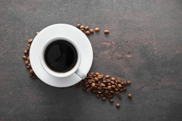 White Ceramic Cup Black Coffee Ground Grains Stone Table Top — Stock Photo, Image