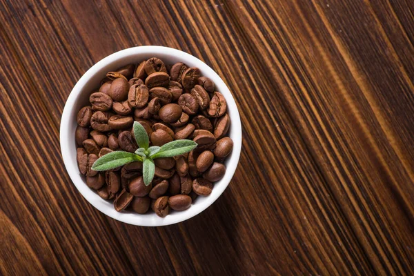 Roasted Coffee Beans Plate Stands Wood Table View — Stock Photo, Image